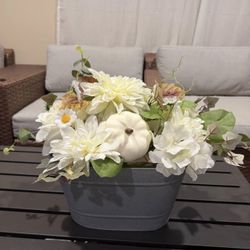Farmhouse fall pumpkin artificial flowers planter metal basket. White brown green floral arrangement