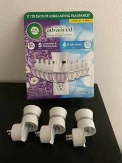 Air Wick Plug-In Scented Oil Air Freshener Starter Kit & 3 Extra Plugins
