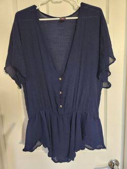 Size large, short sleeve, loose fit, very light, peplum top.