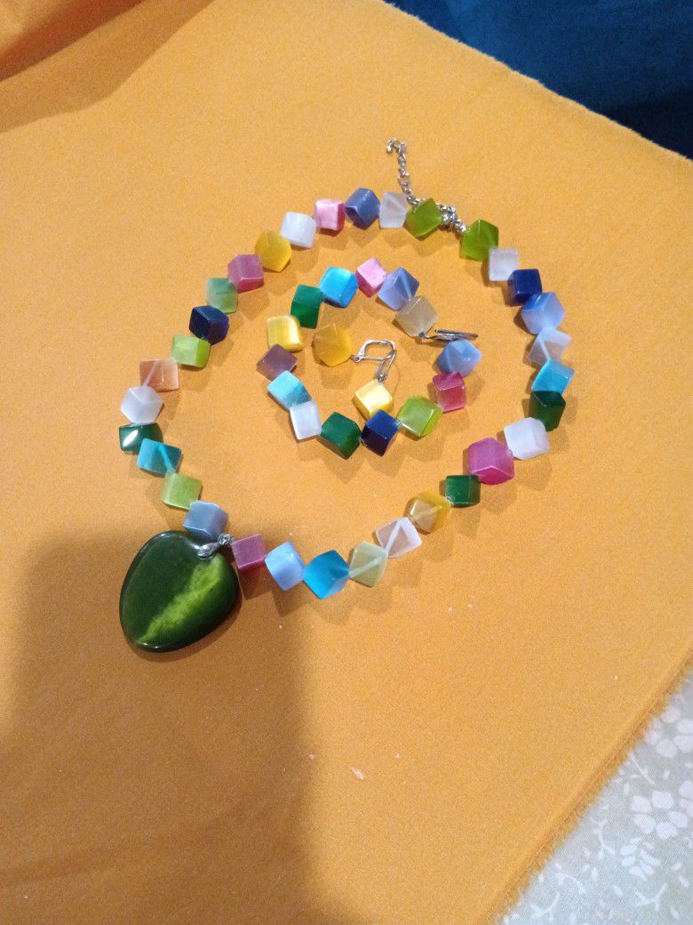  18 inch Genuine Colorful Stones Necklace with a Green Heart Charm . (Handmade).Bracelet & Earrings are included.