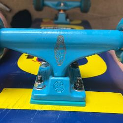 Enjoi is the skateboard brand. the size is 8.0 Its fairly new. 7.5" Lizzie Armanto blue ice cream cone blue Independent trucks. 53" wheels
