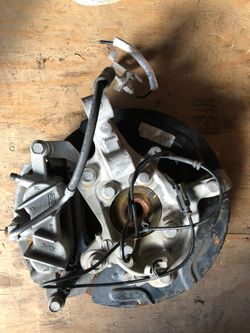 Disc brake with knuckle assembly RH rear AWD 2014 Flex