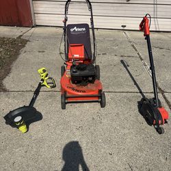 Lawnmower and 2 weed eater’s