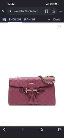pink Gucci Guccissima Emily chain shoulder bag featuring embossed GG leather, gold-tone horsebit hardware, and a matching leather tassel detail.