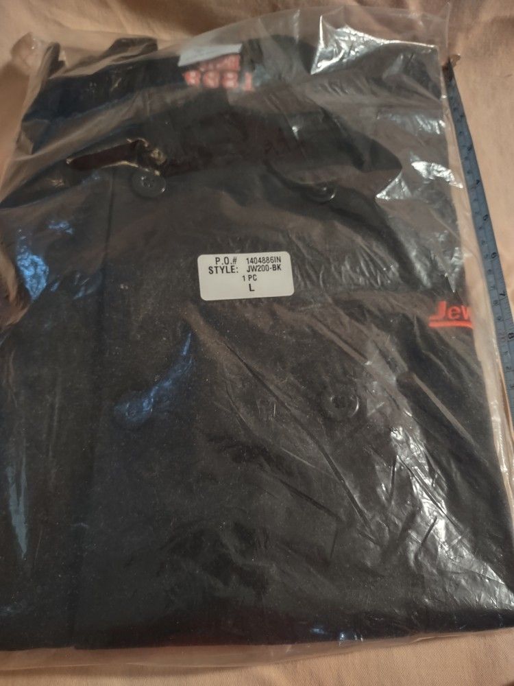 Chef Coat size large new in bag with Jewel embroidered on left chest