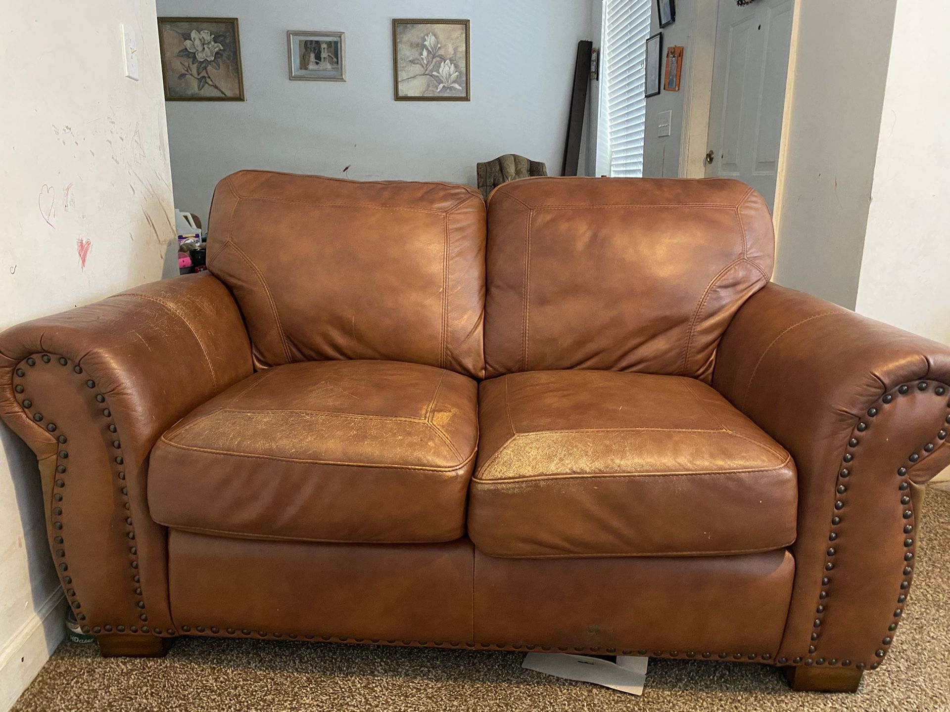 Brown Leather two seater and one seater in great condition, no tears or stains, non smoking home. Moving out so must sell.