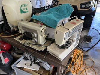 2 vintage Sewing Machines, Unknown Condition One Comes With A Wooden Cabinet Drawers With Miscellaneous Parts