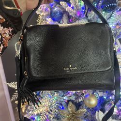 Kate Spade Purse and Can Be Used As A Crossbody 