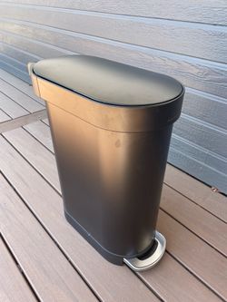 simplehuman Slim Step Trash Can in matte black stainless steel, gently used condition