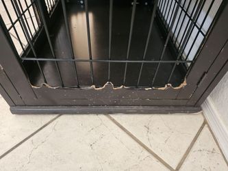 Wood dog cage in good condition.