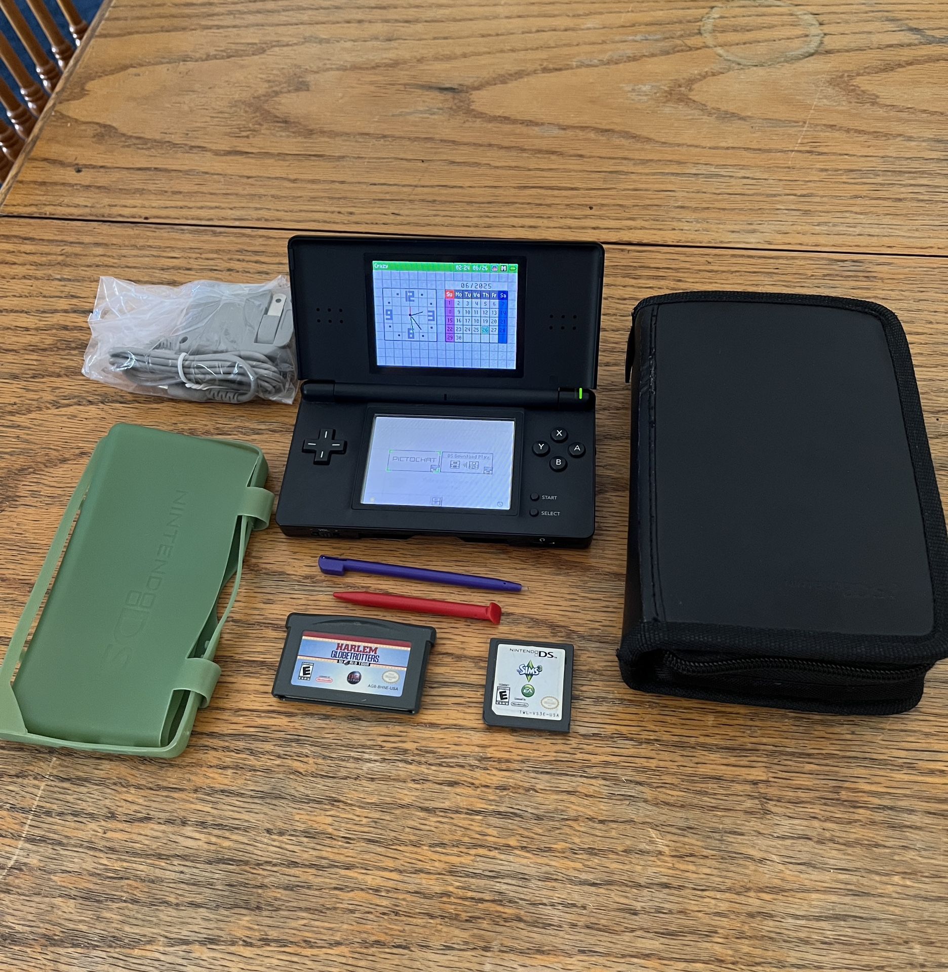 Nintendo DS Lite Black Game System, Console Case, 2 Games, 2 Stylus, Charger & Green Stretch Case Bundle
