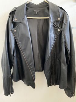 Leather jacket with flower design on the back