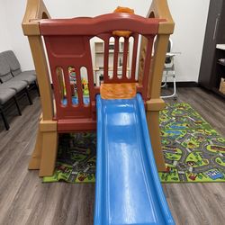 Indoor/outdoor slide playground