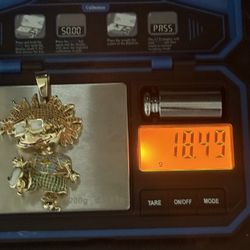 10k gold rug rag pendant “chuckie” 