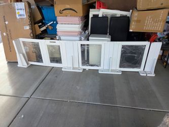 Brand new. LoveTail Baby Gate With Door
4 panels, self standing. 
Price is firm.