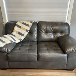 Grey Faux Leather Couch - $250