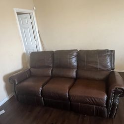 Brown Leather Power Reclining Sofa and Loveseat