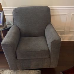 Two Ashley Gray Rocking swivel chairs