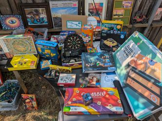 Assortment of toys, games, puzzles