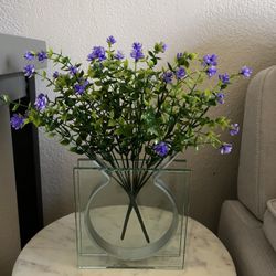 modern glass vase with flowers / home decor