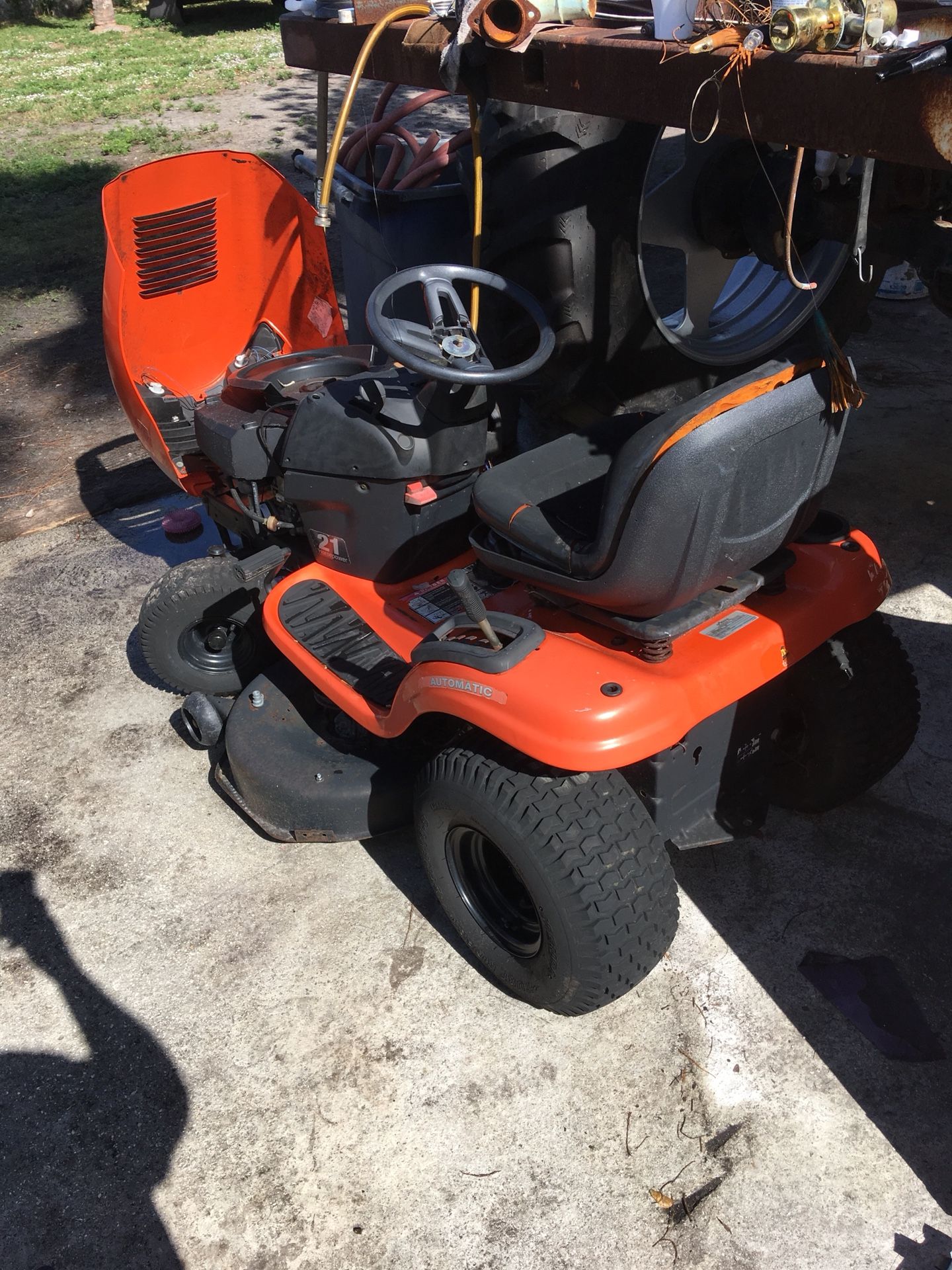 Aaron’s Husky 42 inch cut 21 hp riding mower