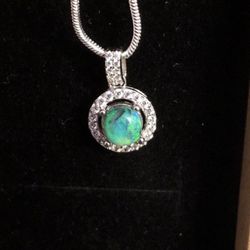 Australian lightning ridge Opal & white topaz accents on a 925 silver pendant hanging on a 925 plated snake chain 0.92ct 6.2x6.1x3.8mm opal