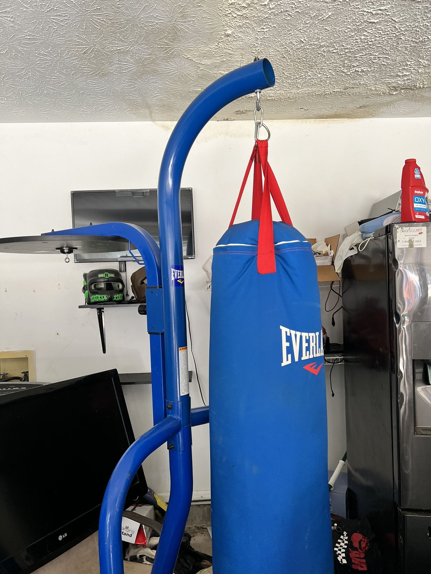 Everlast Heavy Bag with stand and speed bag station.