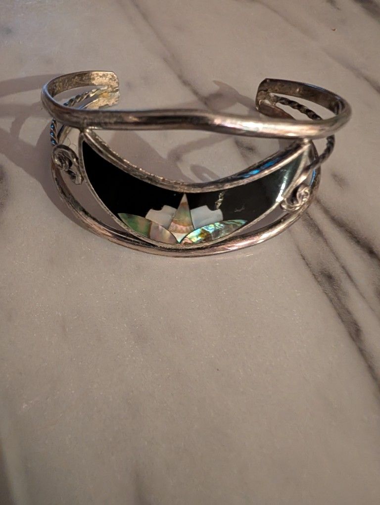 VINTAGE MEXICAN  SILVER TONE CUFF BRACELET WITH ONYX AND ABALONE INLAY