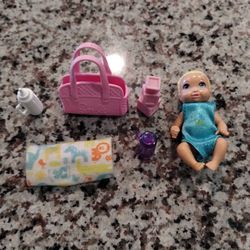 baby Barbie with accessories