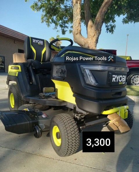 RYOBI 80V HP BRUSHLESS 42IN BATTERY ELECTRIC CORDLESS RIDING LAWN TRACTOR WITH (3) 80V 10AMP BATTERY AND CHARGER