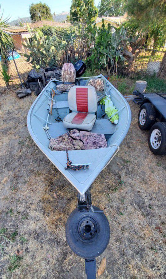 13 Ft. Boat With Suzuki 4 Stroke Outboard Motor And Trailer