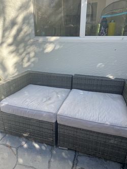 Outdoor Wicker Loveseat with Cushions – $150
