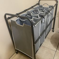 gray rolling laundry sorter with four removable bags
