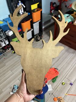 Wooden deer head