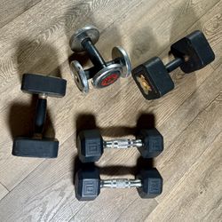 2 Pairs Of Dumbbells  5s And 10s Plus 2 Singles [Reebok) 15 And 20 lbs Respectively.