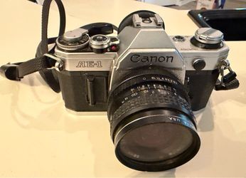 Antique Canon AE-1 35 mm SLR Camera with Speedlite 155A and extra lense