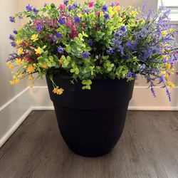 Large Beautiful planter of fade and water resistant flowers.