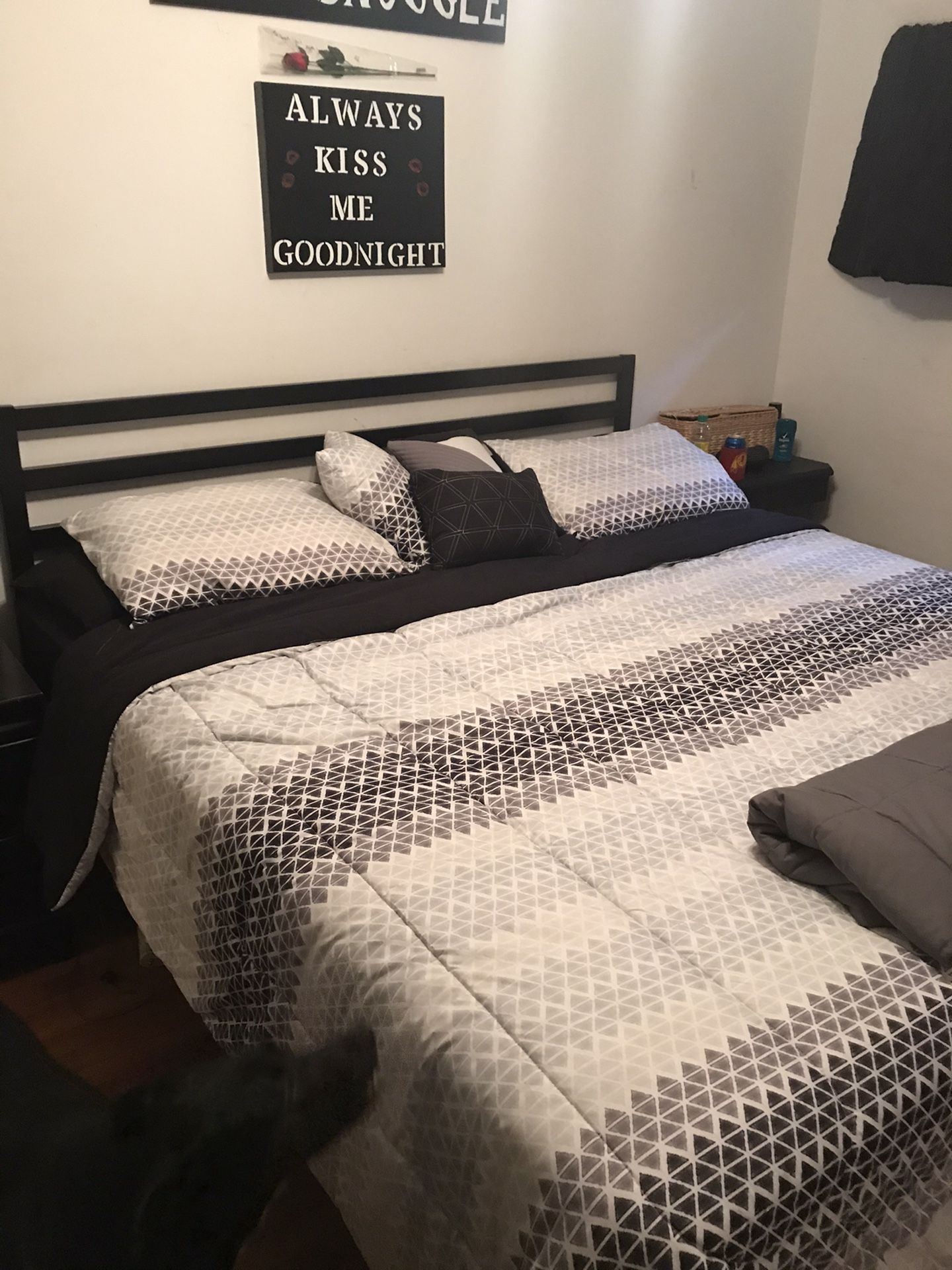 Queen size black medal bed frame queen size mattress 2 twin size box springs RCA surround sound and weight bench with bar and weights