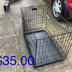 Dog Crate 31” X 21”x 18”.   Two Doors With Divider Excellent Shape