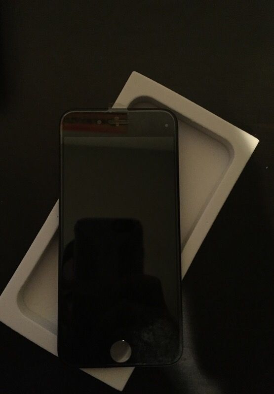 IPhone 6 screen with tools to replace it