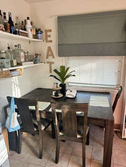 Distressed Table And Chairs