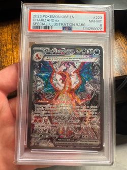 2 Charizard PSA Slabs