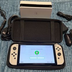 Nintendo switch oled with docking station, joycon grip, case and charger 