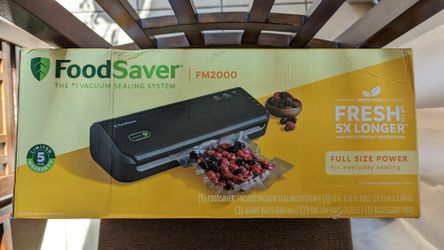FoodSaver Vacuum Sealer Machine with Starter Vacuum Seal Bags & Rolls, Safety Certified, Black - FM2000-FFP