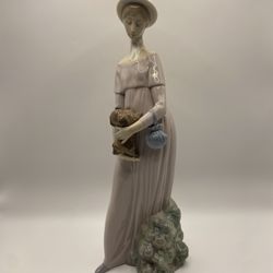 LLADRO Woman Holding Dog Figurine #4994