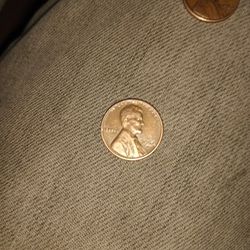 1964 D Copper Penny With Error. L On Liberty Is In The Rim