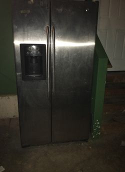 GE French door stainless Steele refrigerator with ice maker.