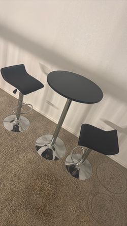 Bar table and adjustable chairs
