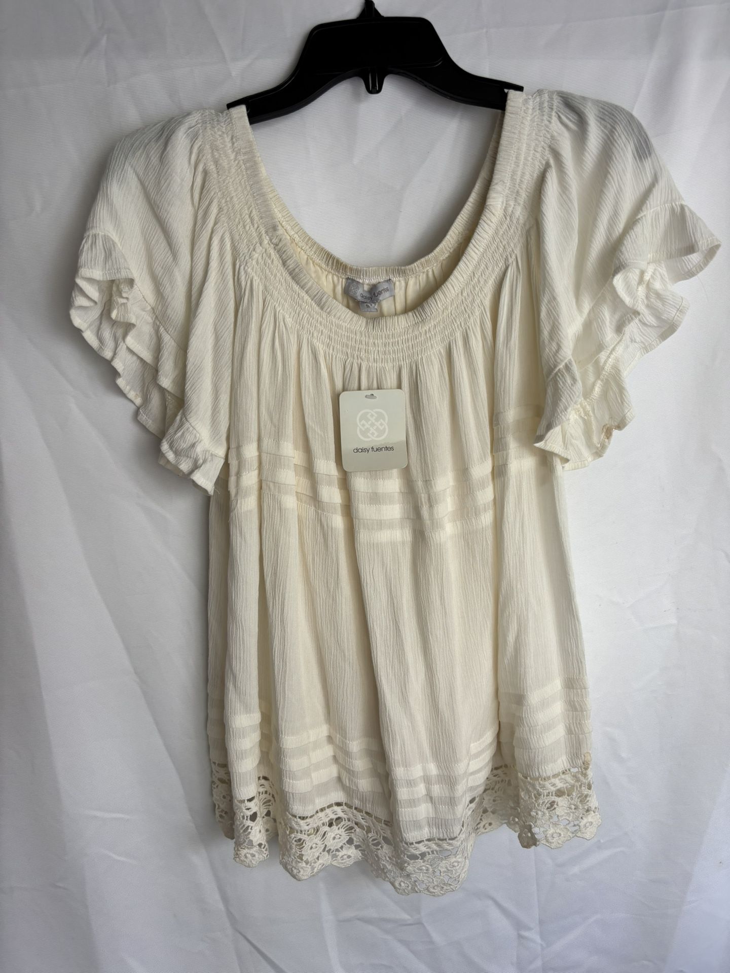 NWT daisy fuentes size s ivory color blouse machine wash
