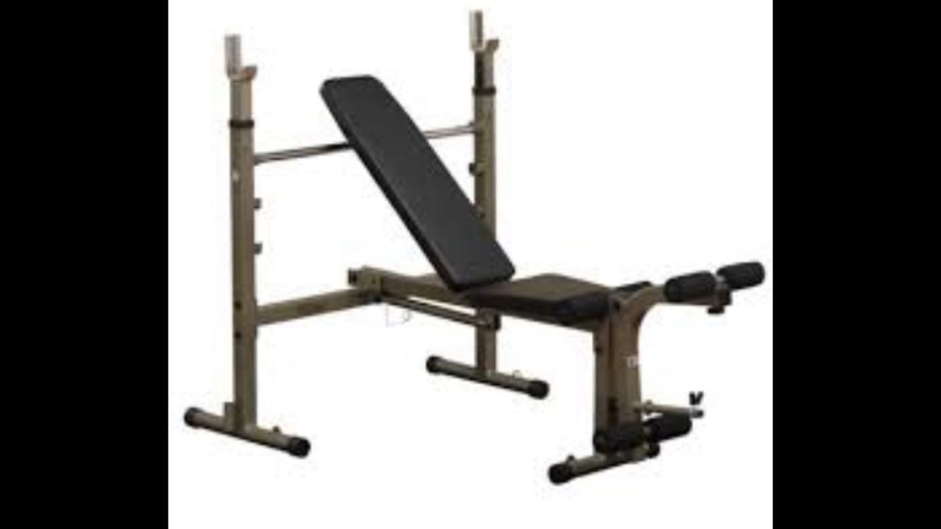 Body Solid Olympic Weight Bench w/ Barbell and 300 lbs of weights